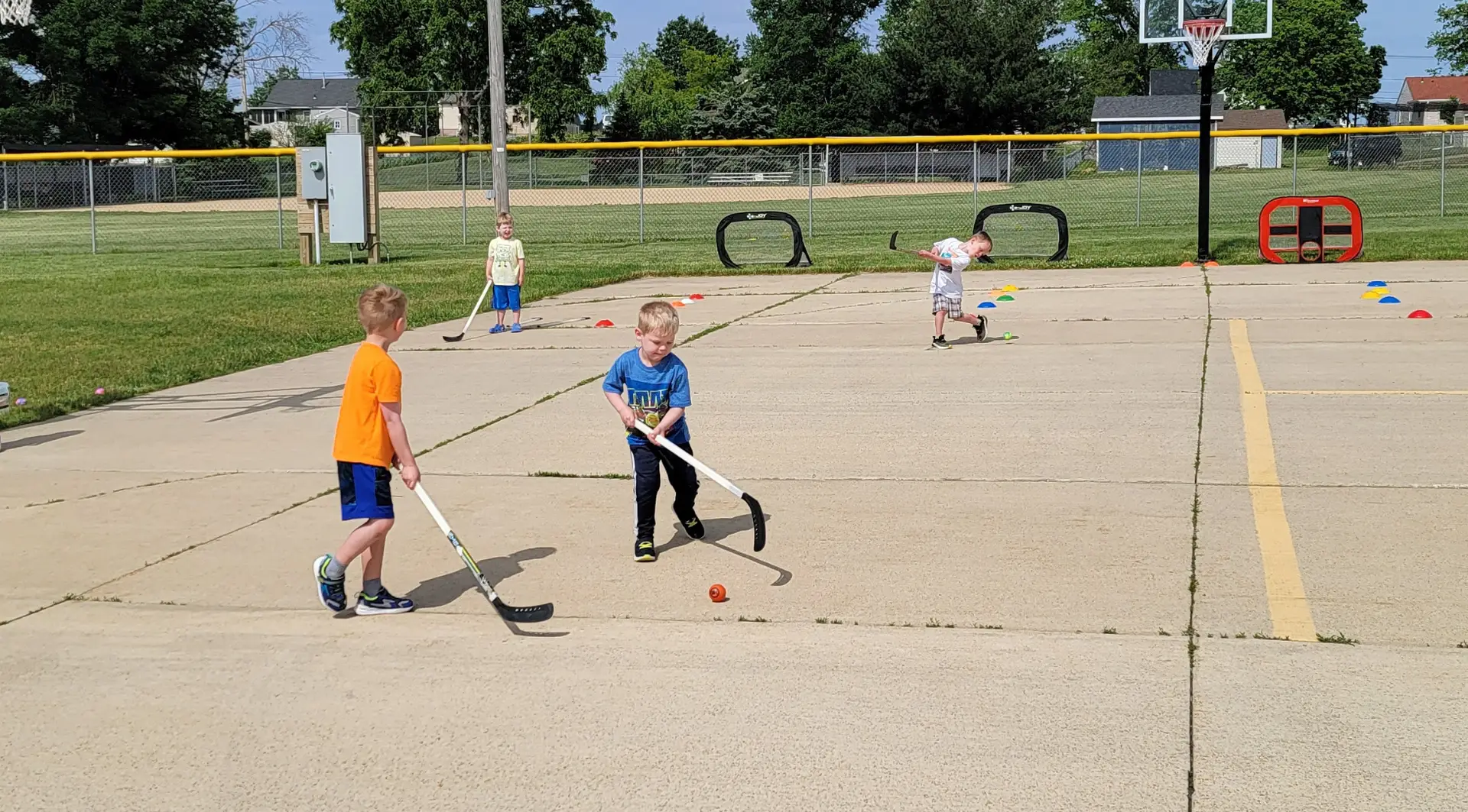 children playing hockey